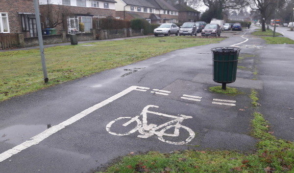 cycle path gives way to a bin