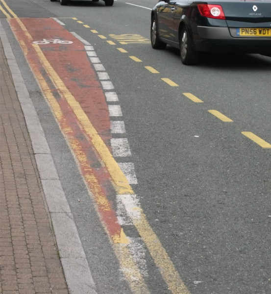 Cycle lane painted within a taxi rank