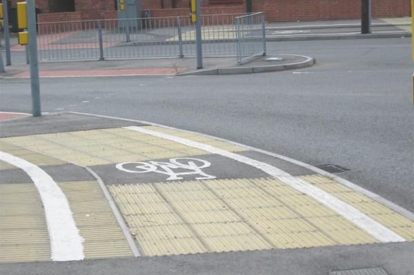 Corrugated tiles at different angles are sure to dismount any cyclist daft enough to attempt riding on this cycle path